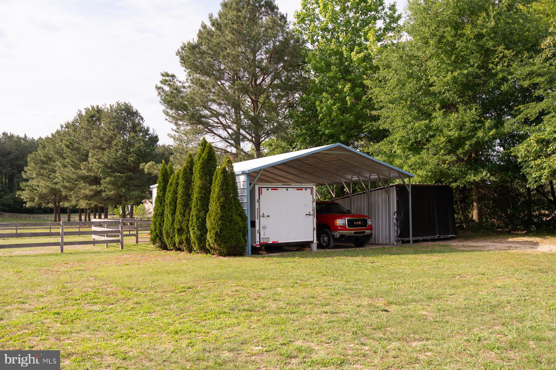 12136 Holly Road Ridgely, MD 21660 - Photo 79 of 136 a view of a house with basketball court