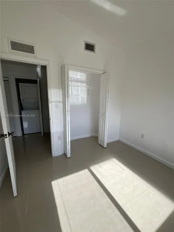 an empty room with closet