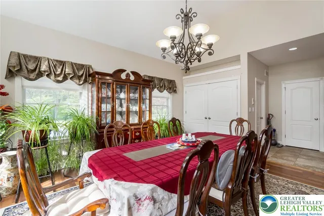 a bed room with a bed and a lamp