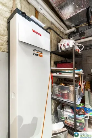 a bathroom with a toilet and a window