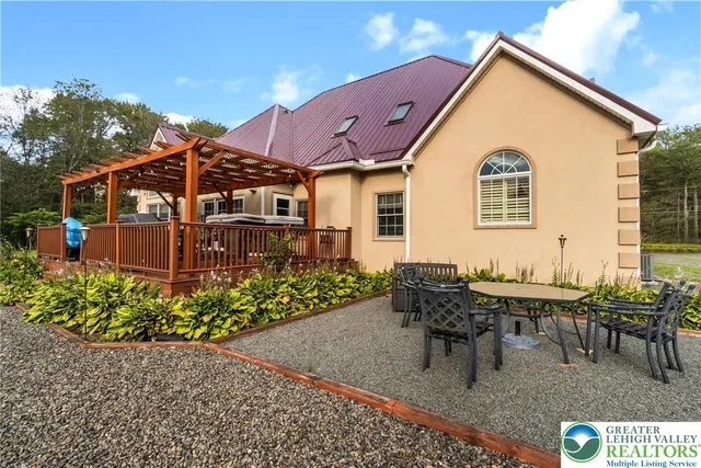 a potted plant sitting in front of a house