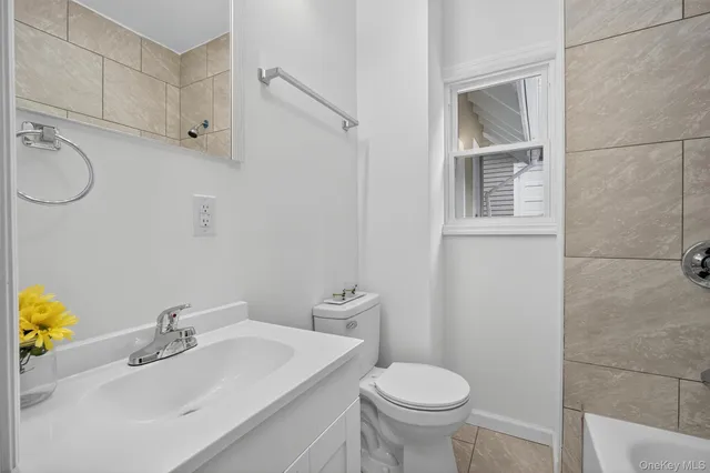 a bathroom with a sink and a toilet
