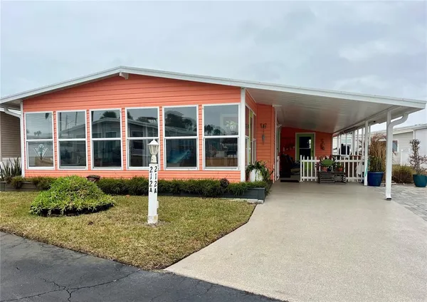 a view of house with an outdoor space