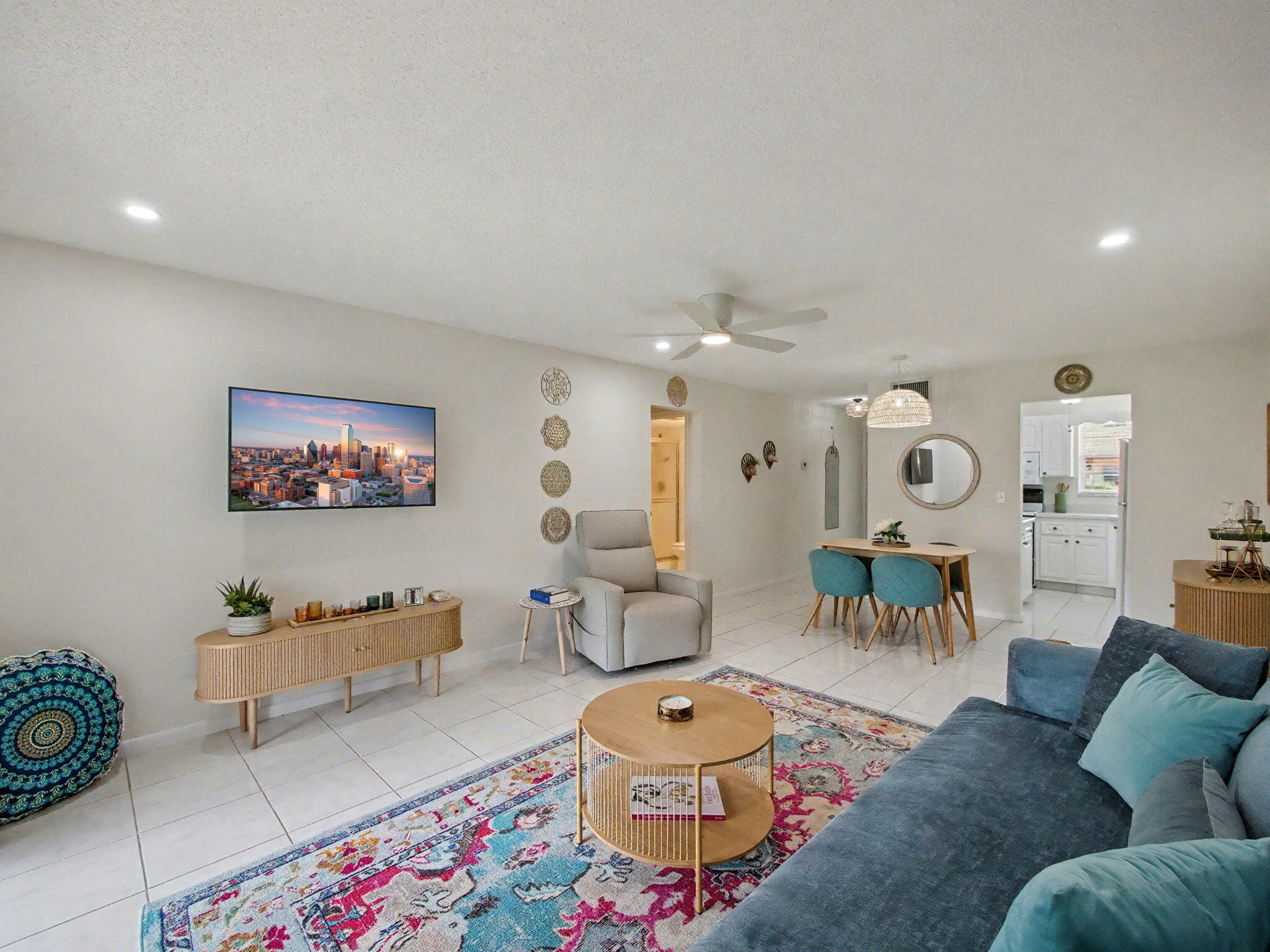 1967 Southwest Palm City Road, Unit 34C Stuart, FL 34994 - Photo 9 of 25 a living room with furniture and wooden floor