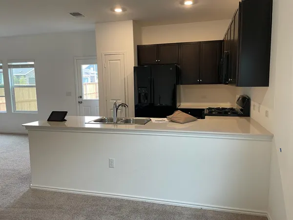 $2,199 | 7501 Poppy Petal Drive, Del Valle, TX 78617