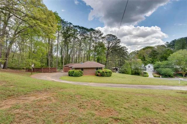a view of a playground with basketball court