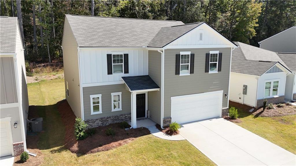 173 Hynes Street Winder, GA 30680 - Photo 2 of 20 a front view of a house with a yard