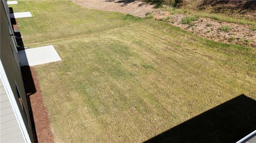 173 Hynes Street Winder, GA 30680 - Photo 4 of 20 a bathroom with a shower