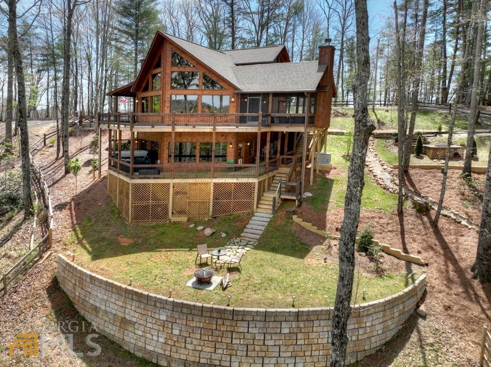 a terrace with outdoor seating and city view
