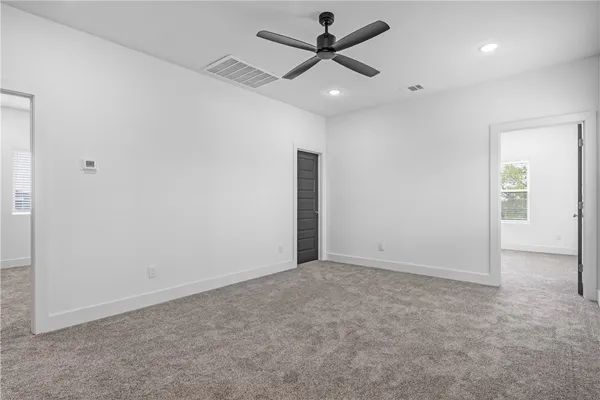 an empty room with windows