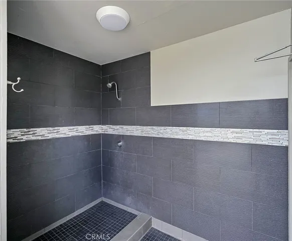 a huge green field with lots of trees