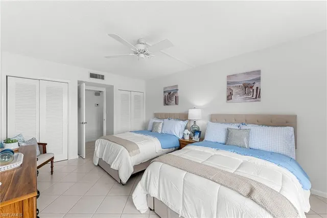 a bathroom with a toilet a sink and a mirror