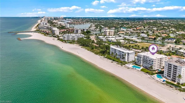 a view of a swimming pool and a yard