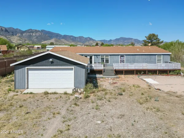 a play room with furniture and a garage