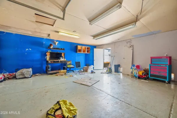 a workspace with furniture and window