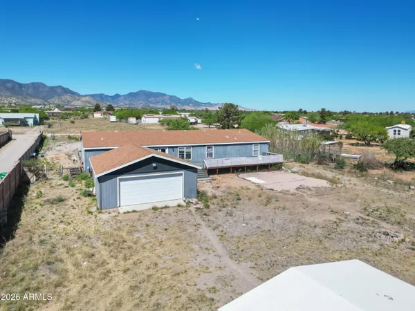 a picture of a lake with a mountain in the background