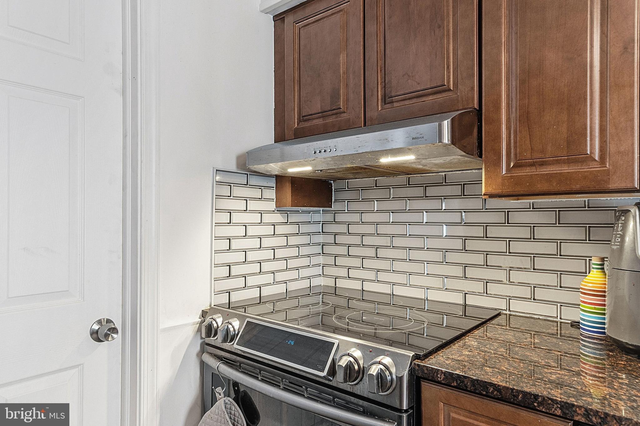 310 Greenwood Road Lansdale, PA 19446 - Photo 11 of 24 a stove top oven sitting inside of a kitchen