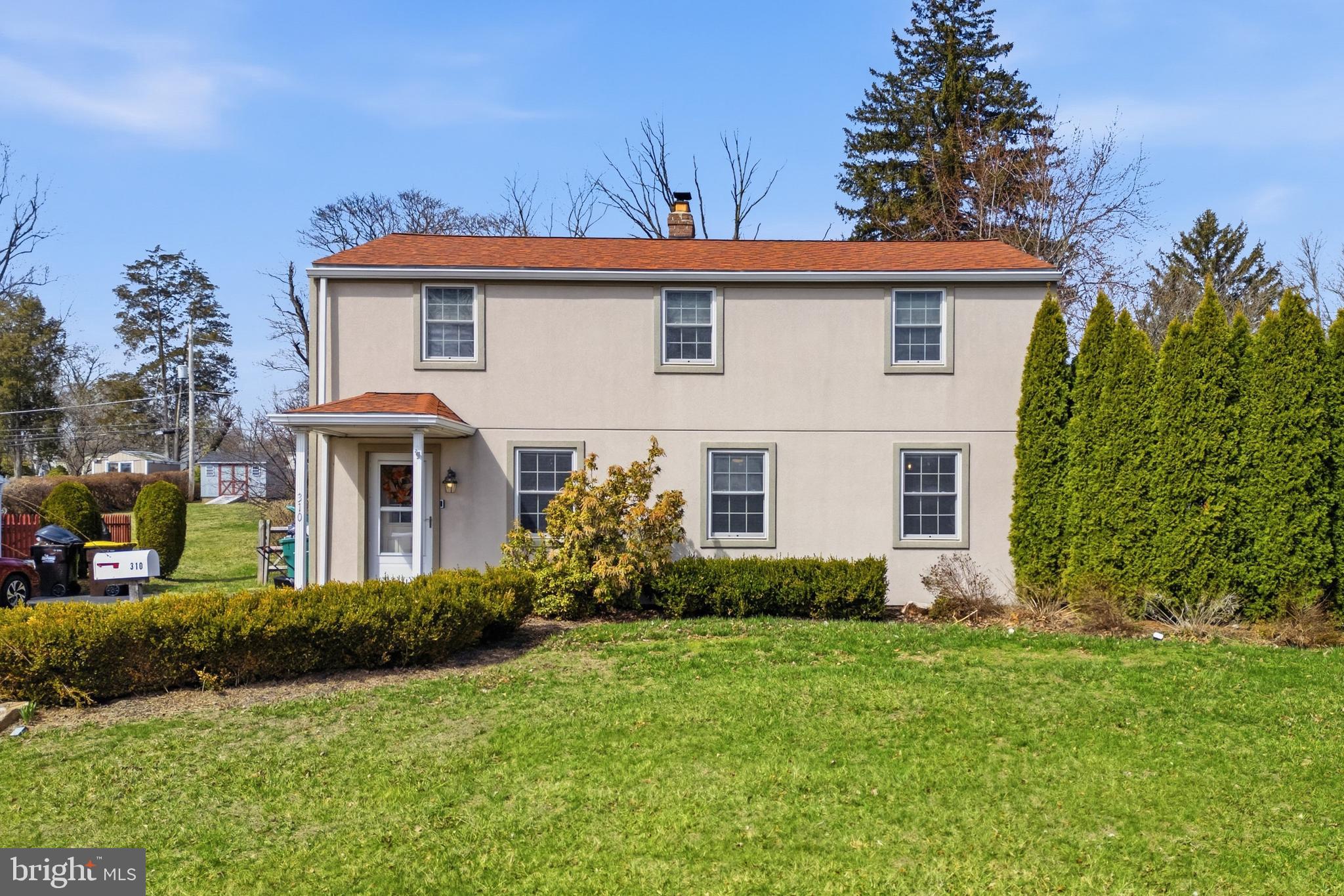 310 Greenwood Road Lansdale, PA 19446 - Photo 20 of 24 a front view of a house with garden