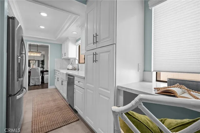 a view of a kitchen with appliances and cabinets