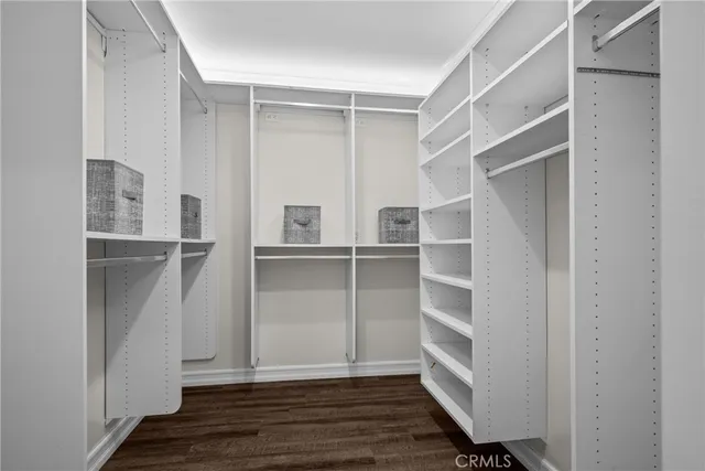 a bathroom with a bathtub shower and sink