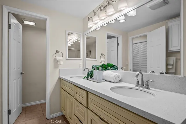 a kitchen with a white cabinets and a stove