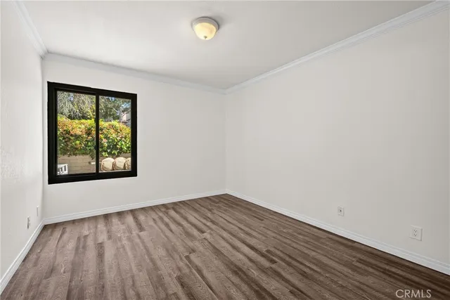 a view of a livingroom with wooden floor