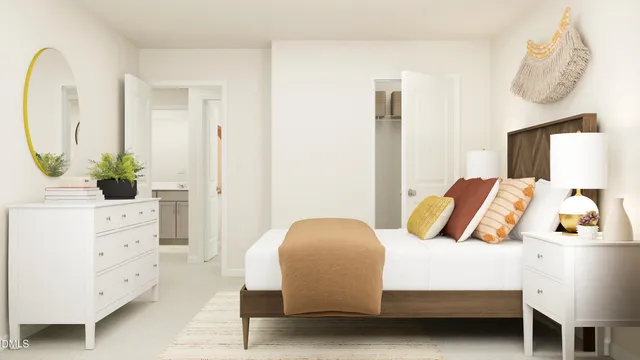 a bedroom with a bed and furniture