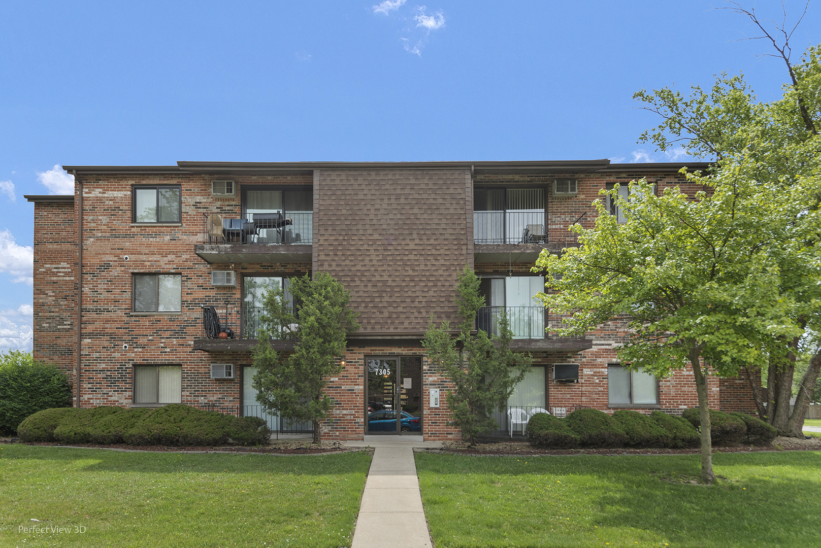7305 Tiffany Drive, Unit 1A Orland Park, IL 60462 - Photo 1 of 20 front view of house with a yard
