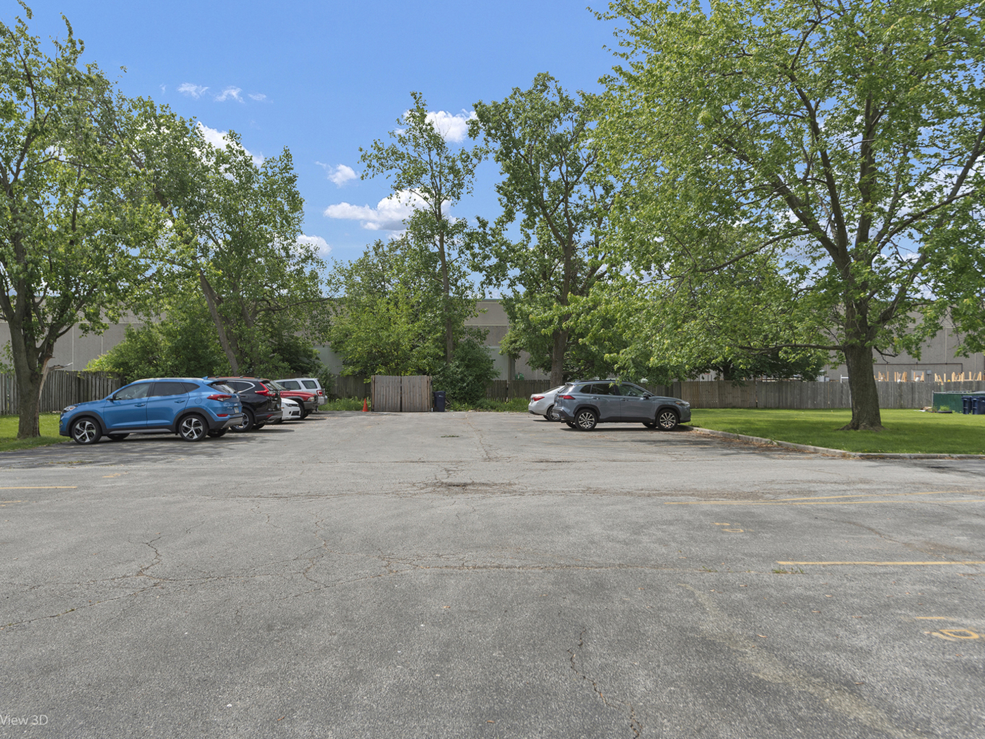 7305 Tiffany Drive, Unit 1A Orland Park, IL 60462 - Photo 20 of 20 a car parked on the side of the road