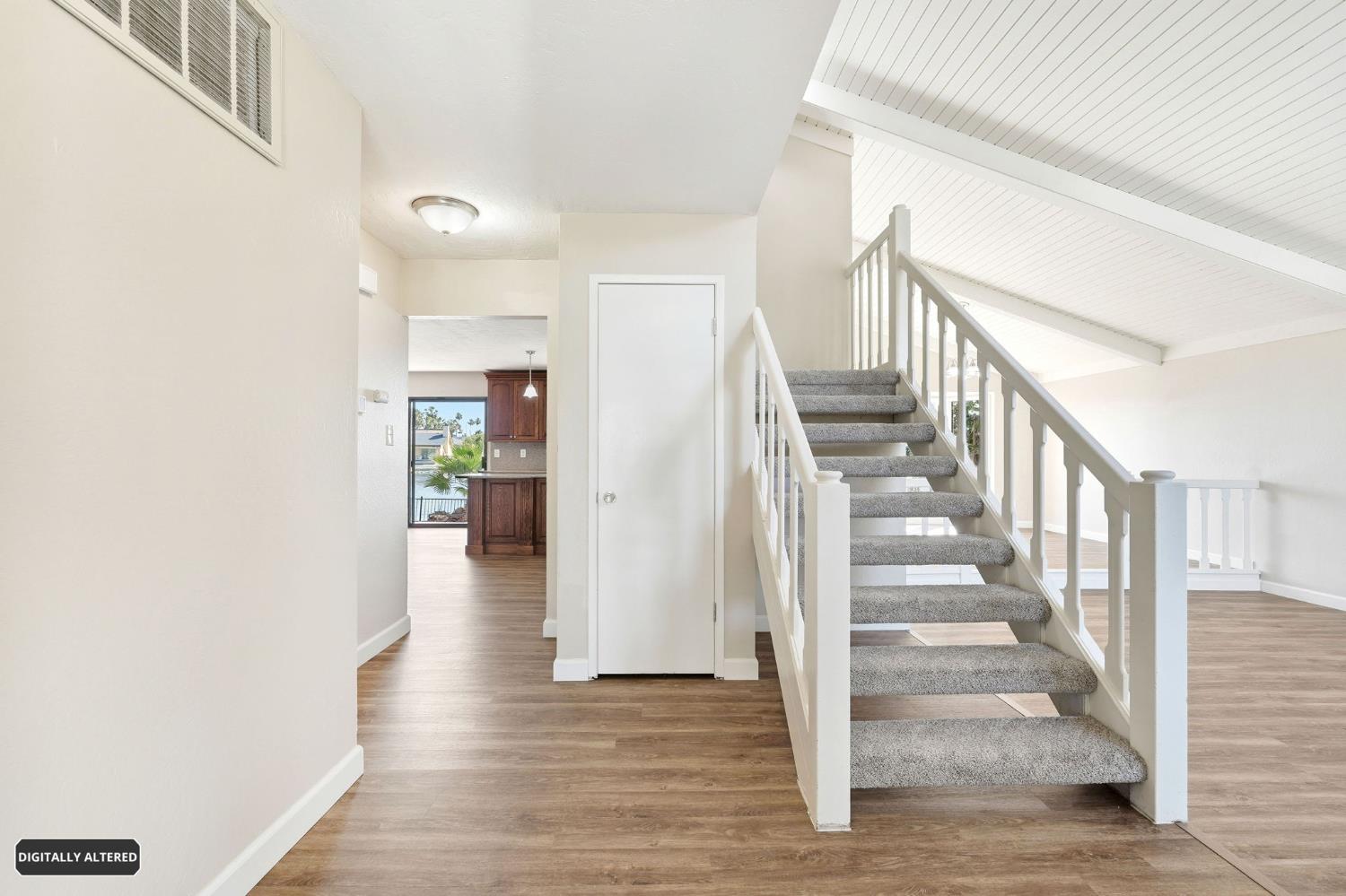 5501 Riverlake Road Discovery Bay, CA 94505 - Photo 11 of 60 a view of entryway and hall with wooden floor