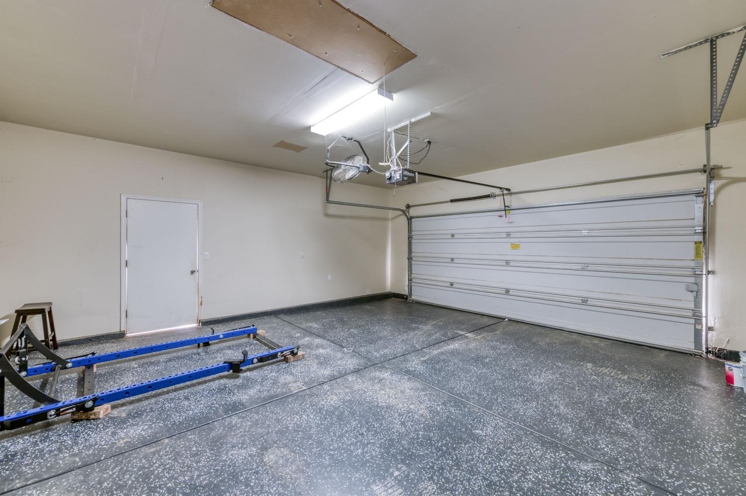 1697 North Connery Lane Clovis, CA 93619 - Photo 25 of 56 a view of a room with gym equipment