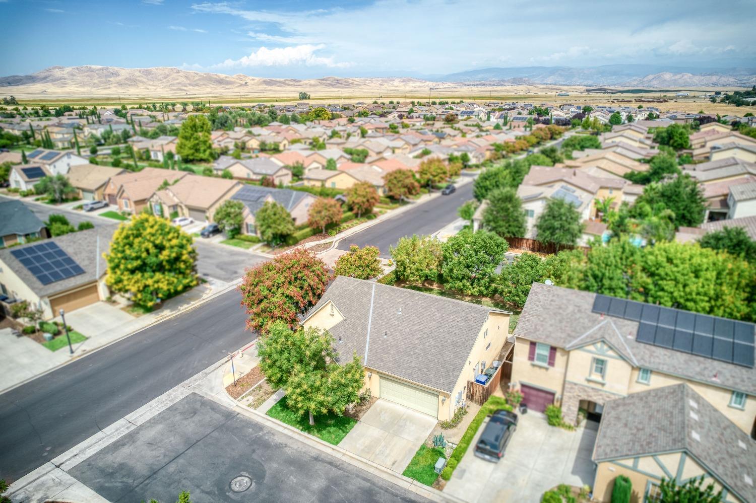 1697 North Connery Lane Clovis, CA 93619 - Photo 38 of 56 an aerial view of residential houses with outdoor space