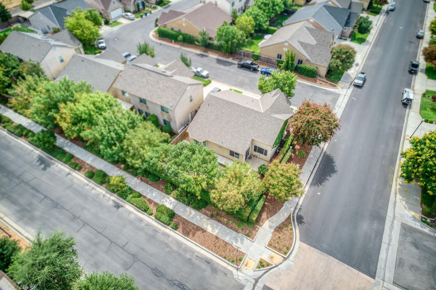 1697 North Connery Lane Clovis, CA 93619 - Photo 39 of 56 an aerial view of a garden