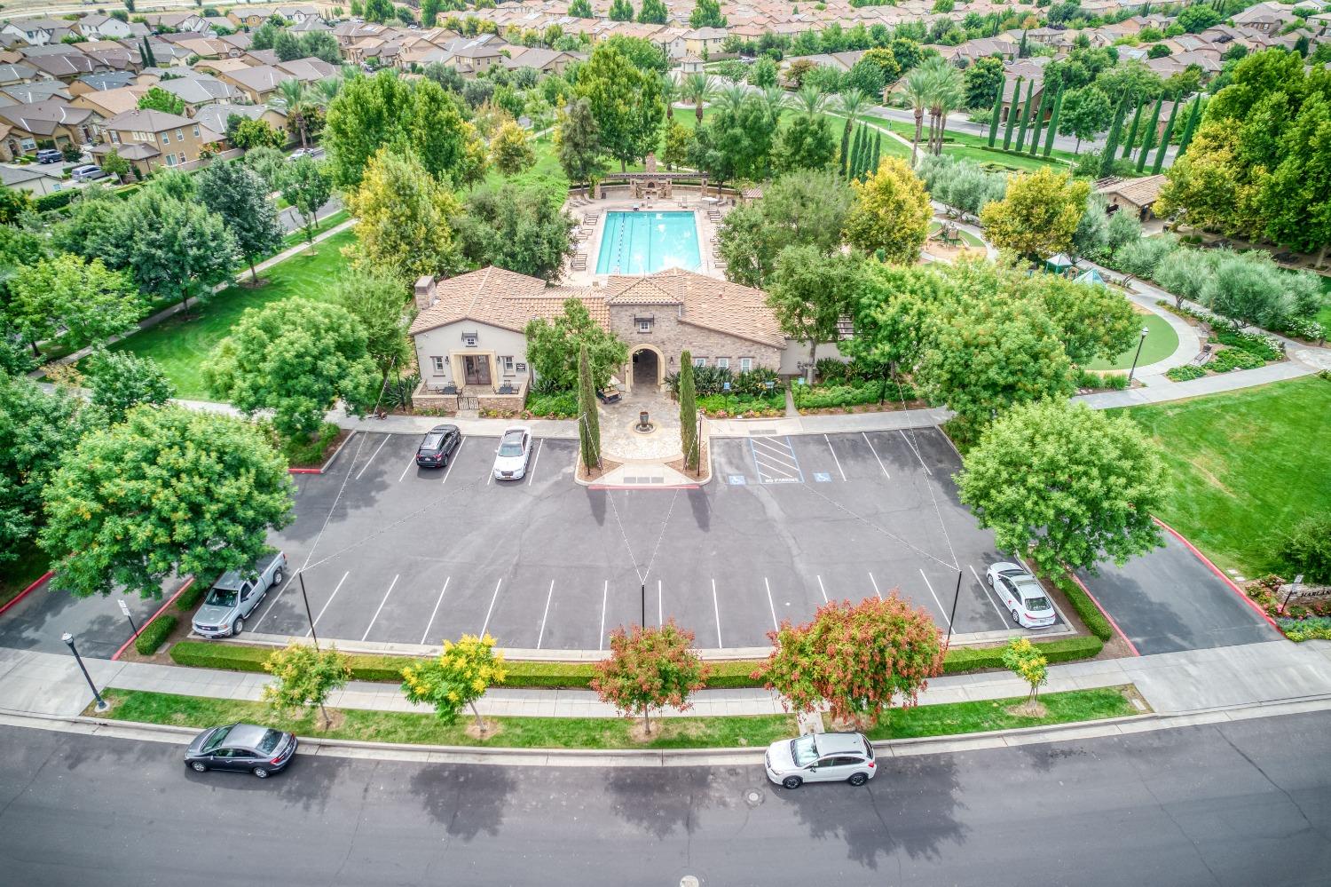 1697 North Connery Lane Clovis, CA 93619 - Photo 49 of 56 an aerial view of a wooden house with a yard and outdoor seating