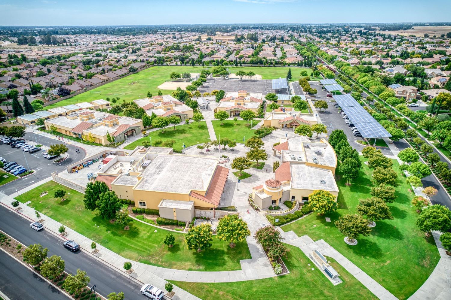 1697 North Connery Lane Clovis, CA 93619 - Photo 51 of 56 an aerial view of residential houses with outdoor space