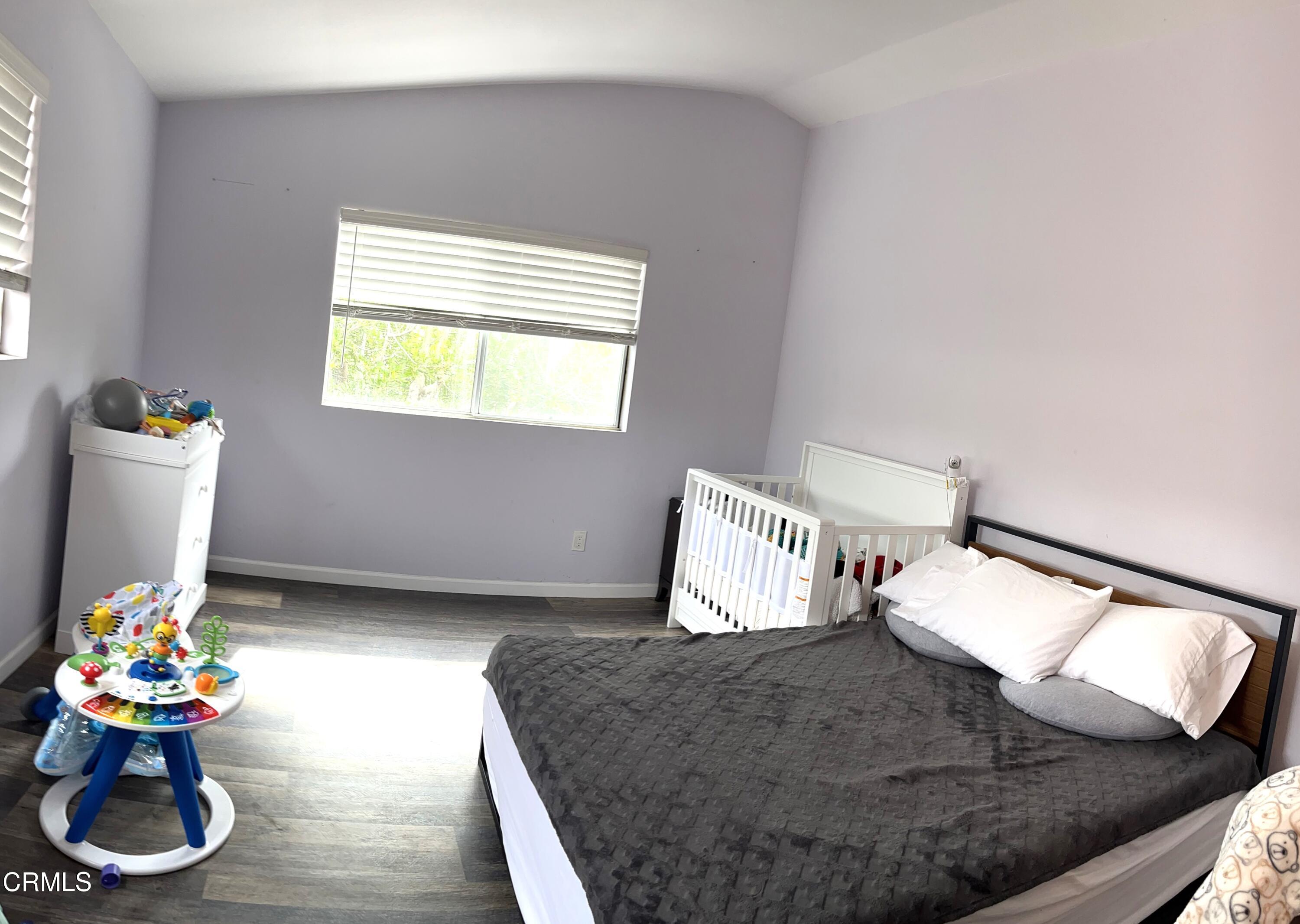 511 East Bard Road, Unit 16 Oxnard, CA 93033 - Photo 11 of 13 a living room with furniture and a couch
