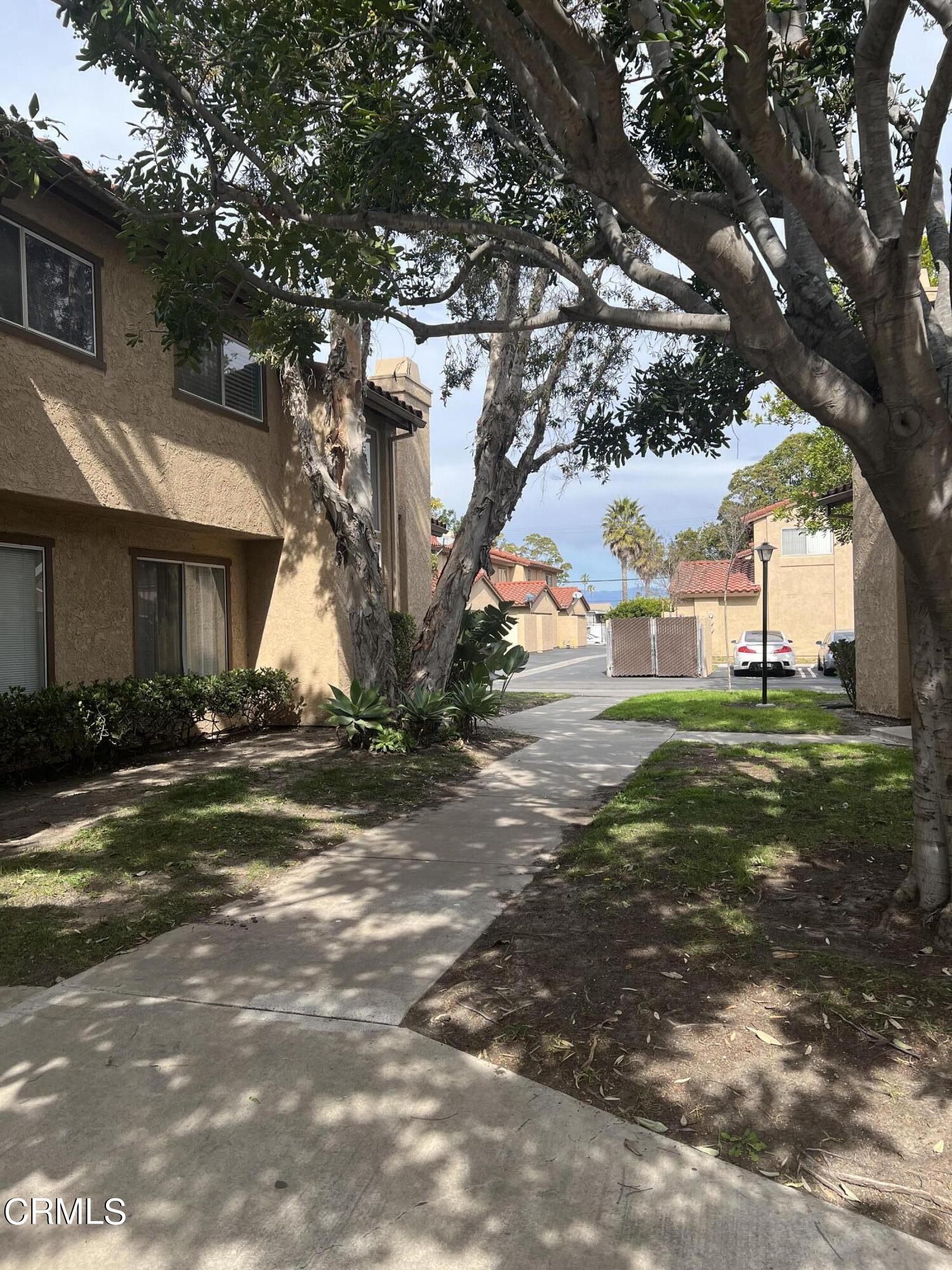511 East Bard Road, Unit 16 Oxnard, CA 93033 - Photo 4 of 13 a view of a house with a yard