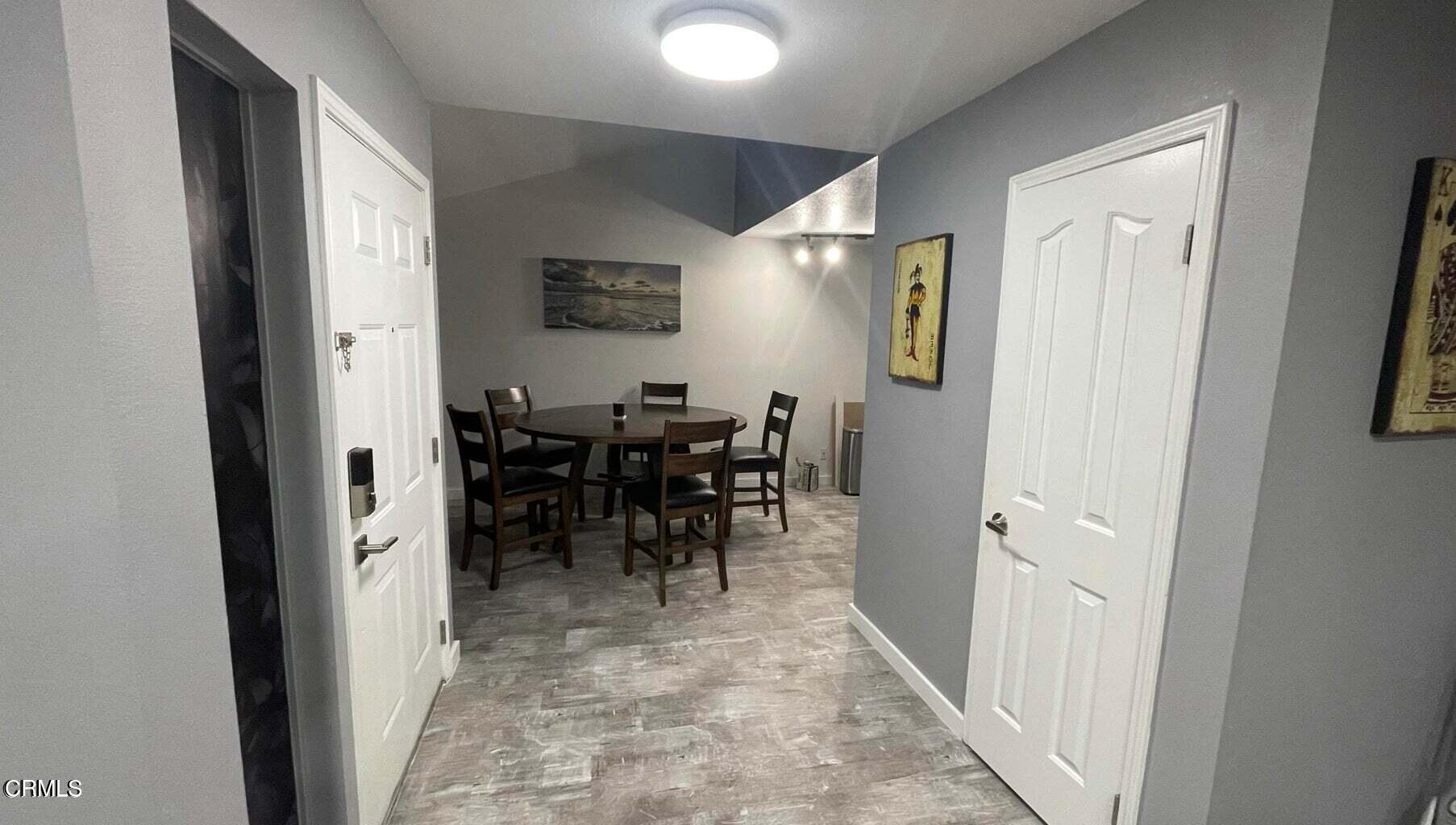 511 East Bard Road, Unit 16 Oxnard, CA 93033 - Photo 7 of 13 a view of a hallway with seating area