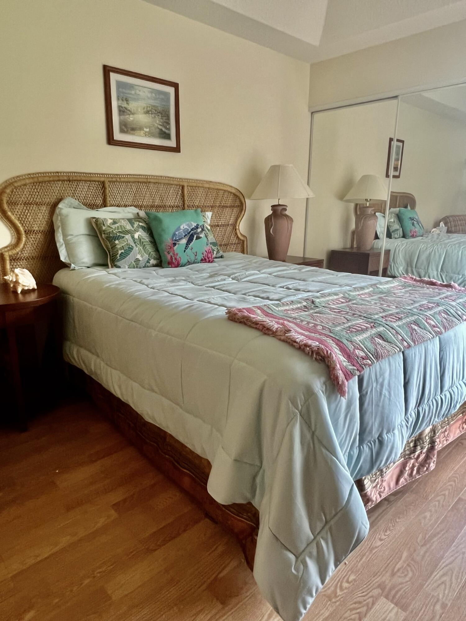 101 Muirfield Court, Unit F Jupiter, FL 33458 - Photo 12 of 20 a bedroom with a bed and window