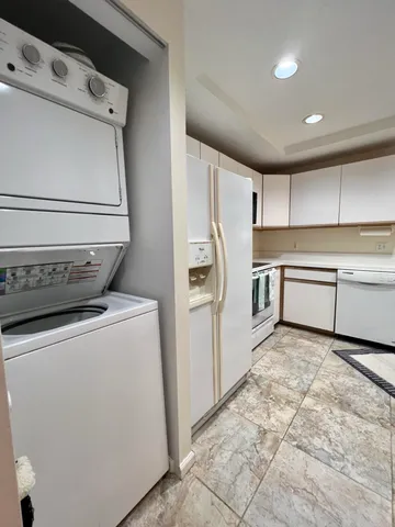 a view of a storage & utility room with washer and dryer