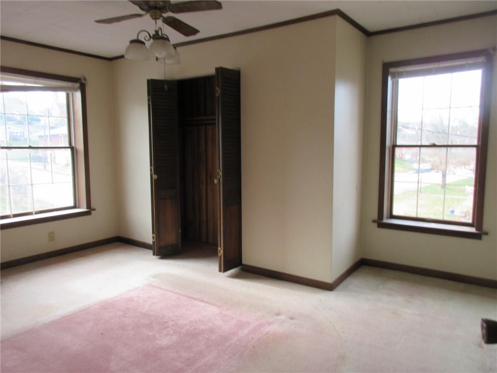 809 Thomas Street Monongahela, PA 15063 - Photo 8 of 11 an empty room with windows and closet