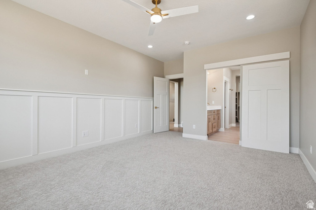 1471 Colbey Loop Santa Clara, UT 84765 - Photo 35 of 45 Spacious room featuring board and batten wainscoting, recessed lighting, and a ceiling fan with light fixture
