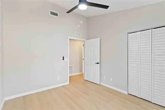 an empty room with a empty space and a window