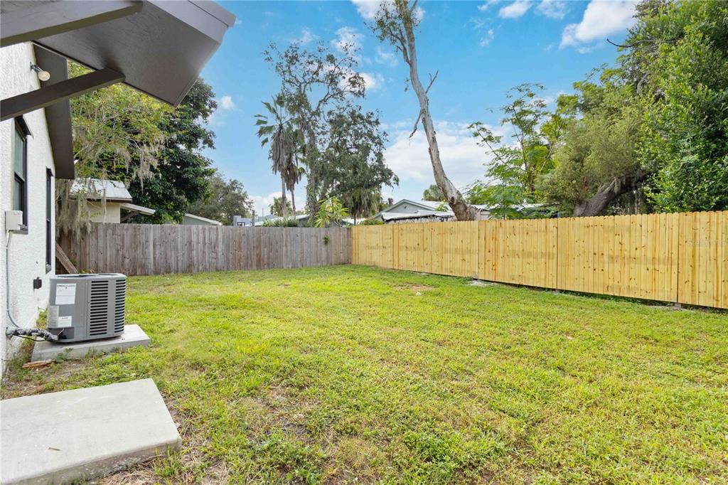 1368 21st Street Sarasota, FL 34234 - Photo 30 of 34 a view of a backyard with a tree