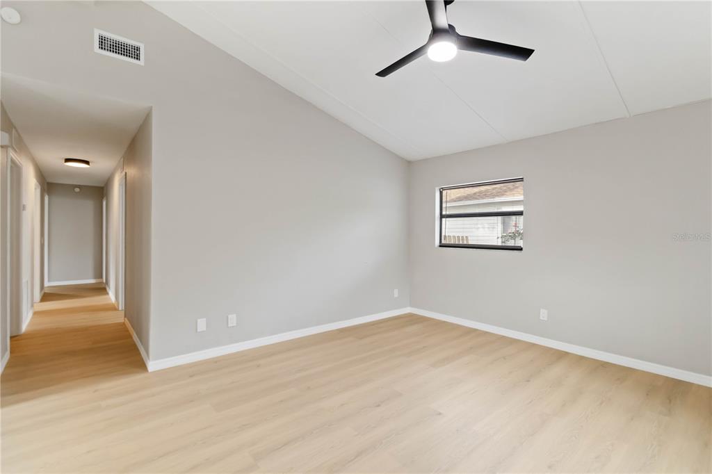 1368 21st Street Sarasota, FL 34234 - Photo 8 of 34 a view of an empty room with a window