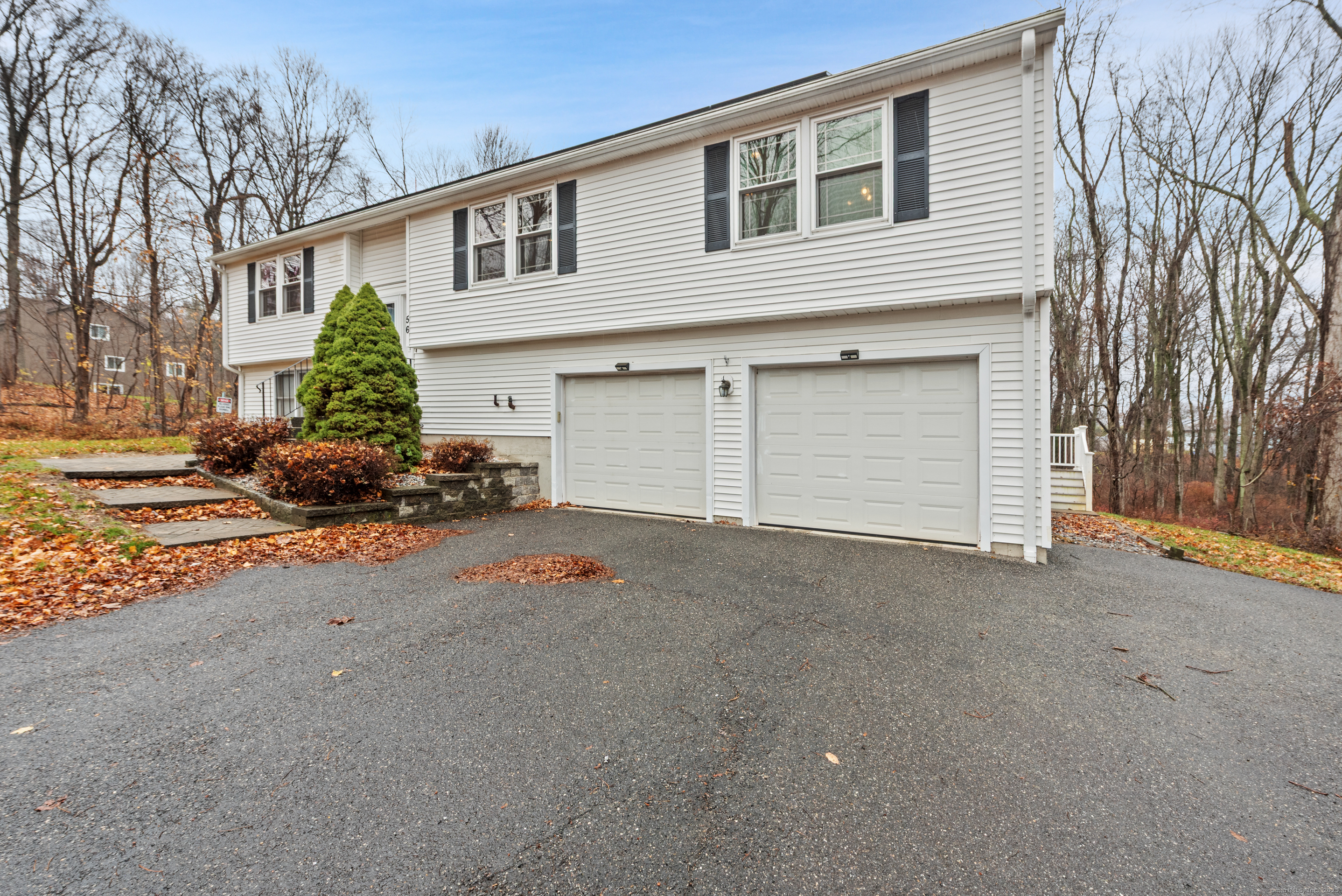 56 Great Hill Road Seymour, CT 06483 - Photo 2 of 40 a view of a house with a street