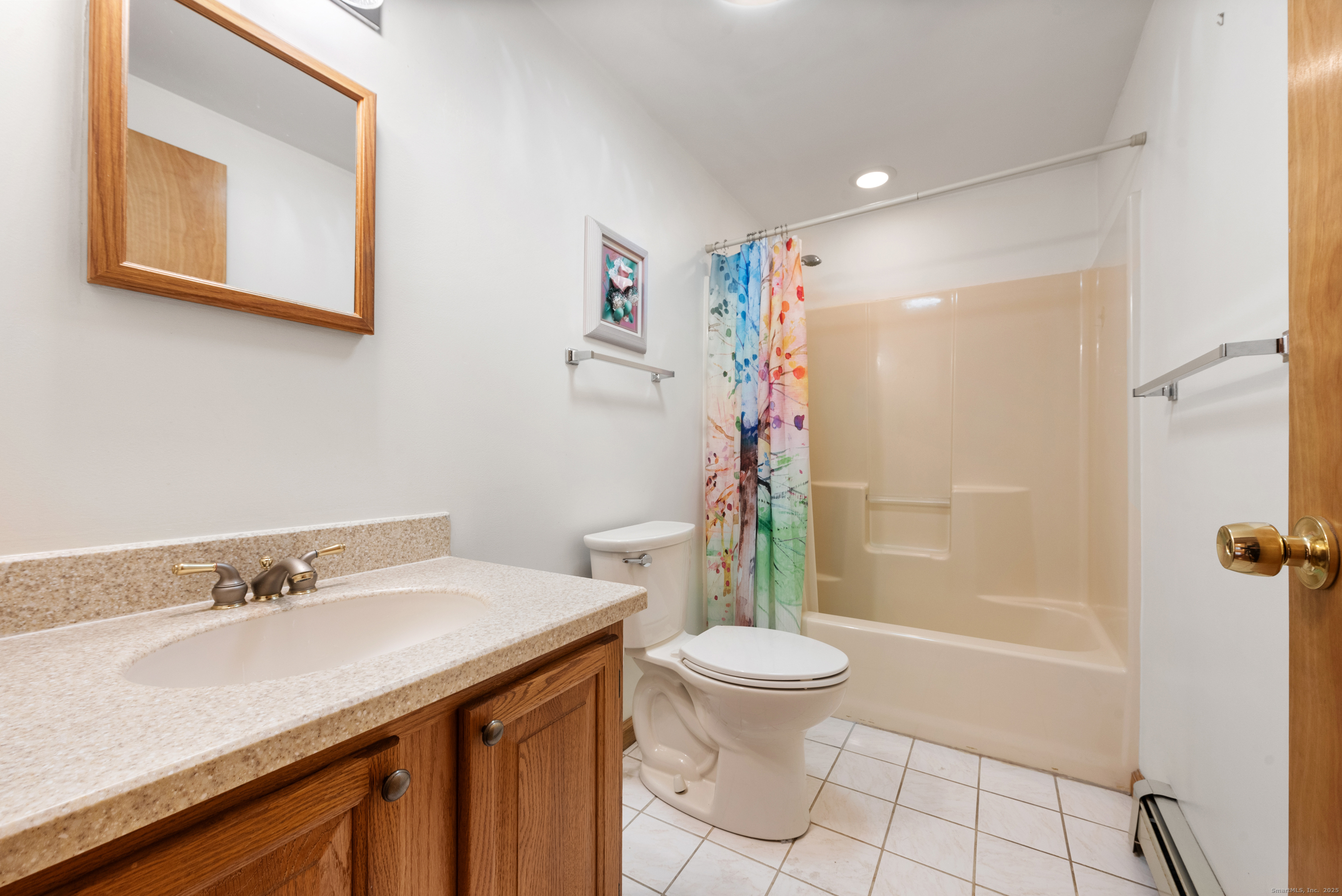 56 Great Hill Road Seymour, CT 06483 - Photo 26 of 40 a bathroom with a sink a toilet and shower