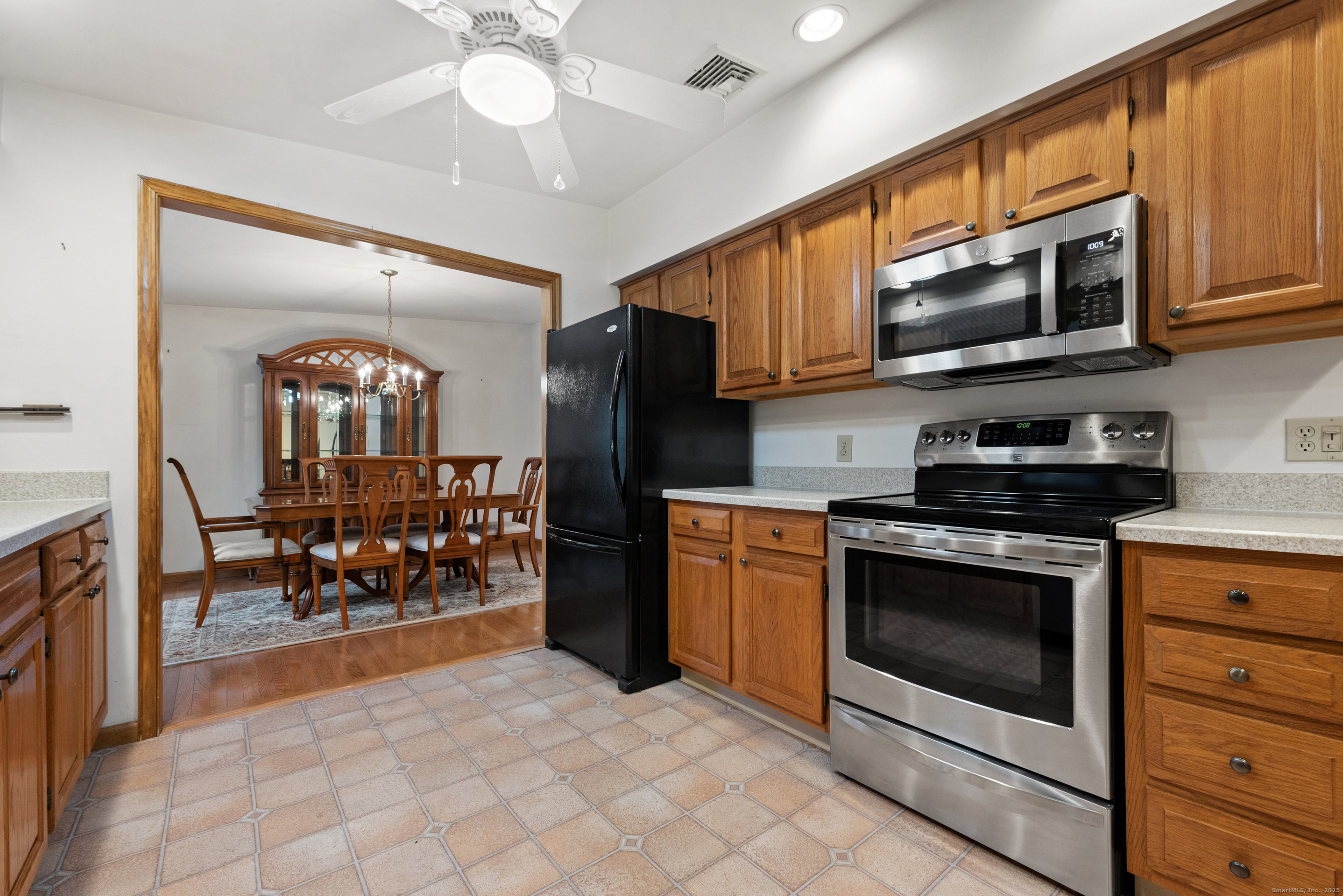 56 Great Hill Road Seymour, CT 06483 - Photo 4 of 40 a kitchen with stainless steel appliances granite countertop a stove and a microwave