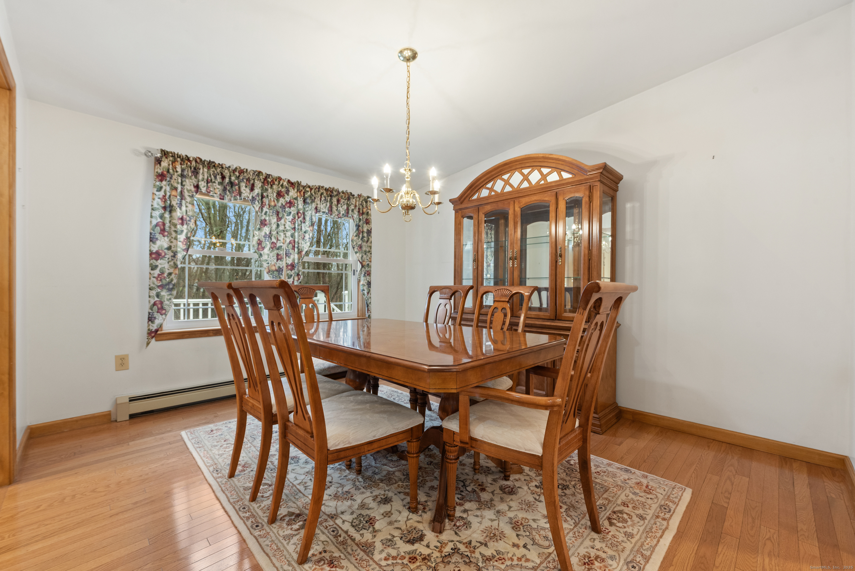 56 Great Hill Road Seymour, CT 06483 - Photo 9 of 40 a view of a dining room with furniture window and wooden floor