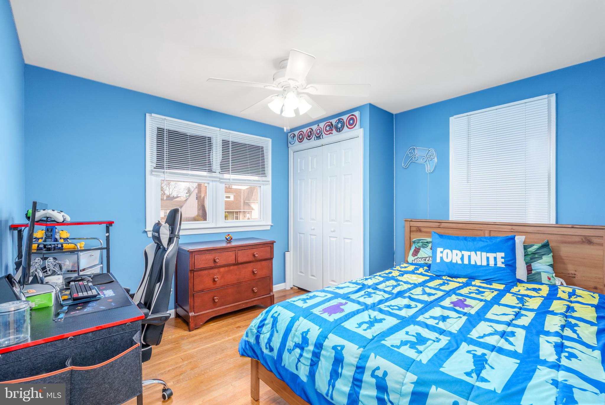 1003 Piper Road Wilmington, DE 19803 - Photo 15 of 40 a bedroom with a bed and a dresser